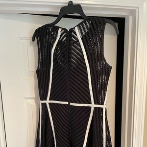 Mini dress, detail pattern and texture. Black with white detail.